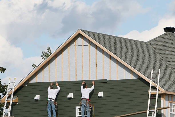 Professional Siding technician working in London, KY